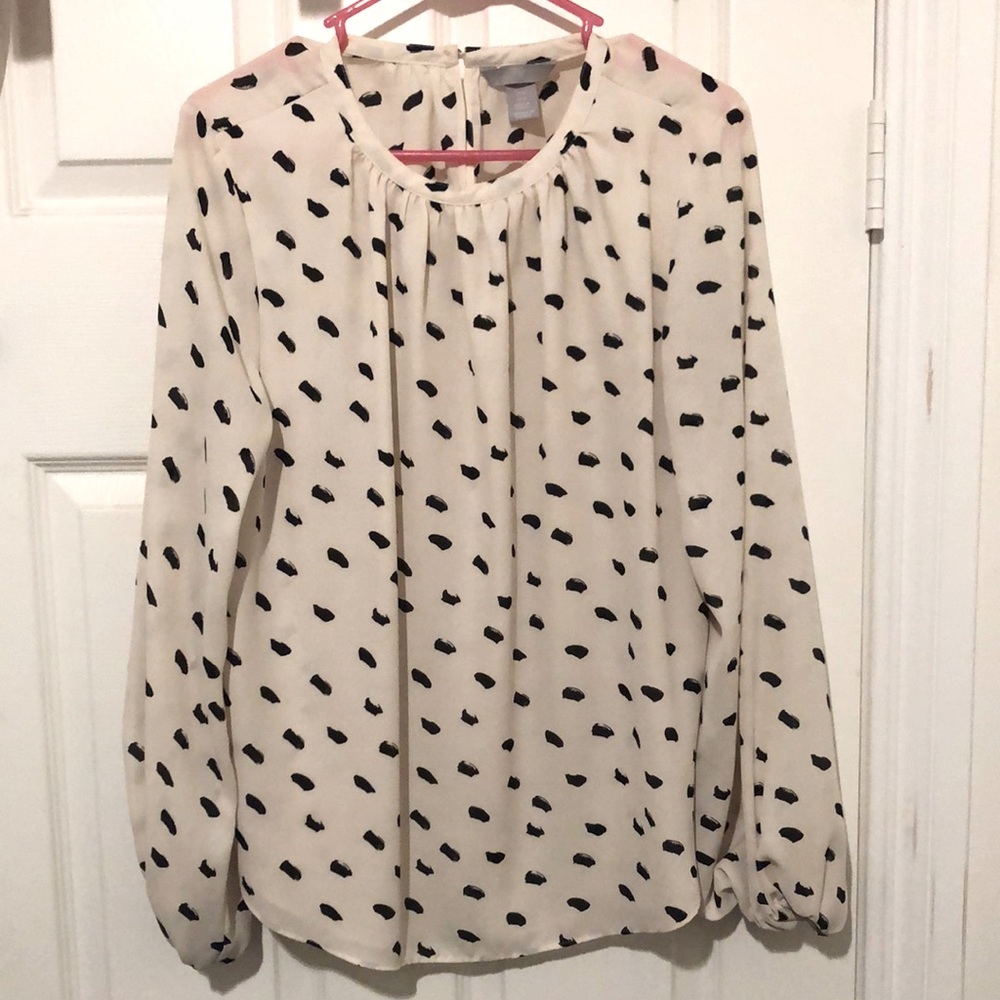 White and black patterned blouse